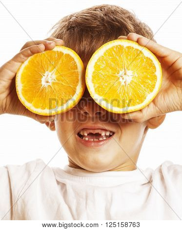 little cute boy with orange fruit double isolated on white smiling without front teeth adorable kid cheerful close up