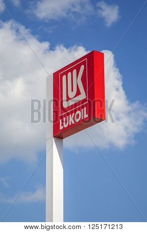 BELGRADE, SERBIA - AUGUST 17, 2014: Logo in front of Lukoil gas station. Headquartered in Moscow Lukoil is the second largest public company in terms of proven oil and gas reserves.