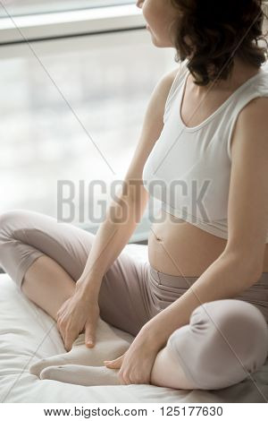 Pregnant Yoga Woman Doing Butterfly Pose