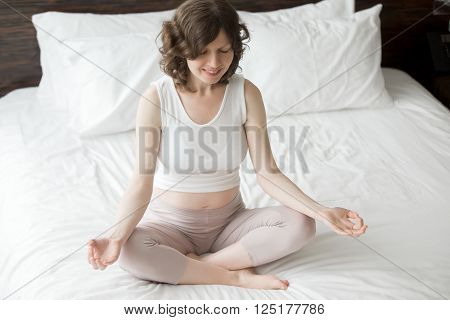 Pregnant Yogi Woman