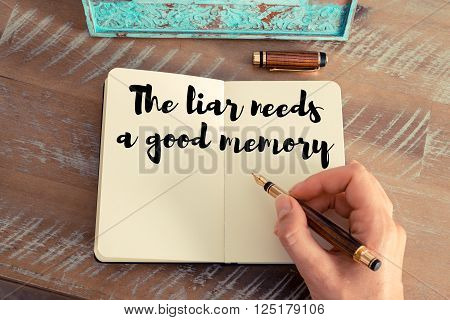 Handwritten quote The liar needs a good memory