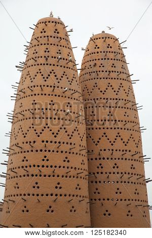 Reflections of old traditional birds house in Doha Qatar
