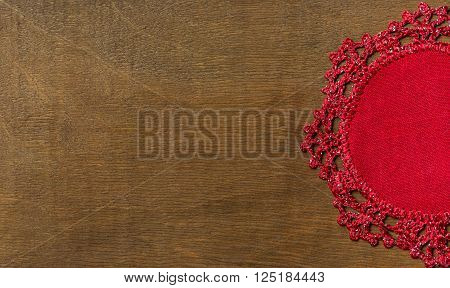 Hand-Knitted linen table napkin handmade on wood background