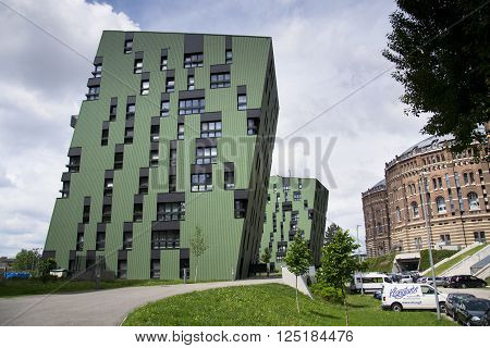 Vienna, Austria - May 7: Modern Buildings In Front Of Gasometers Of Vienna In Austria On 7 May 2012