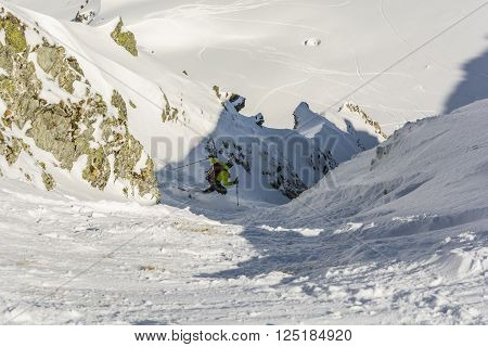 Zakopane ,Poland - March 28 2016: Ski mountaineering during difficult and not safe exit steep gully.
