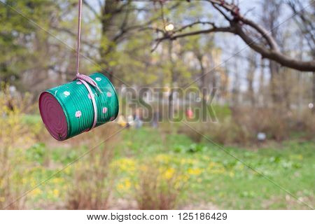 Colored feeding for the wild birds made from tin can