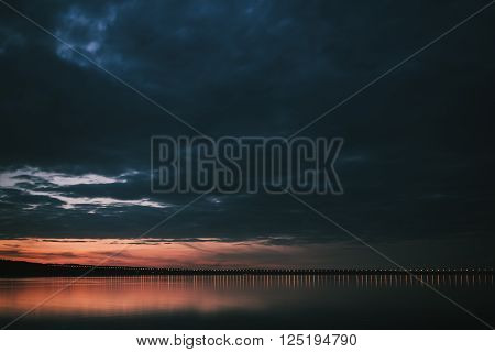 Dramatic sunset over Volga River and Presidental Bridge, located in Ulyanovsk Russia