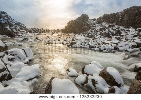 Oxararfoss Waterfall in the winter in pingvellir valley  National Park in Iceland