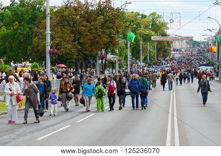GOMEL BELARUS - SEPTEMBER 12 2015: Unidentified people walk on Sovetskaya street during the City Day celebrations Gomel Belarus