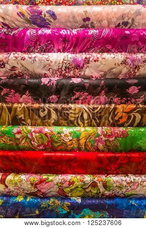 Beijing, China - October 14, 2013: A selection of silk fabrics viewed vendor in Beijing, China.