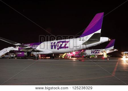 Kiev Ukraine - March 27 2011: Wizz Air Airbus A320 passenger planes at the airport at night