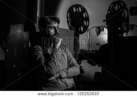 man standing near a film projector in the room projectionist
** Note: Visible grain at 100%, best at smaller sizes