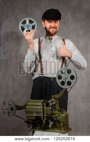 Cameraman with with a old film projection