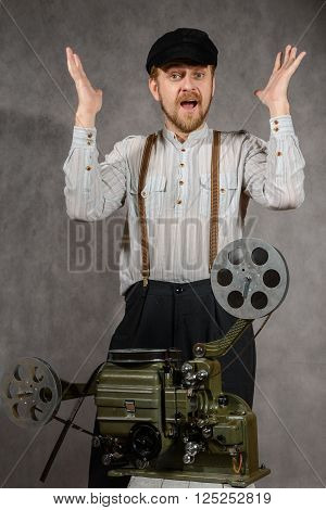 Cameraman with with a  old film projection