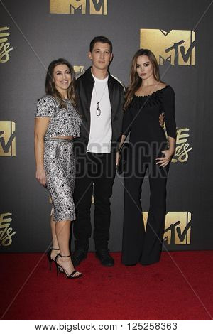 LOS ANGELES - APR 9:  Dana Teller, Miles Teller, Kaleigh Sperry at the 2016 MTV Movie Awards Arrivals at the Warner Brothers Studio on April 9, 2016 in Burbank, CA