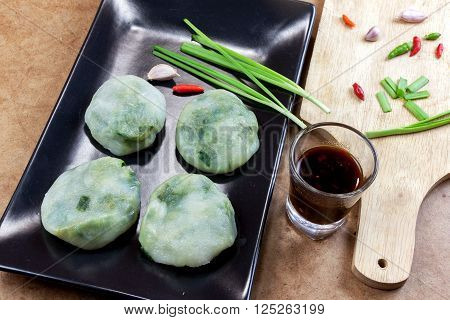 Allium tuberosum. Garlic chives with soy source. Dim sum is chinese cuisine.