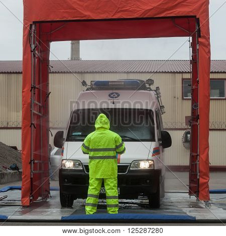 Saint-Petersburg Russia - April 6 2016: Item sanitization personnel and radiation decontamination equipment attracted to liquidate radiation accidents