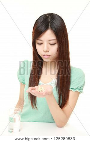 portrait of young Japanese woman suffers from melancholy