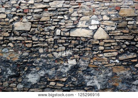 Closeup of the ancient stone wall texture