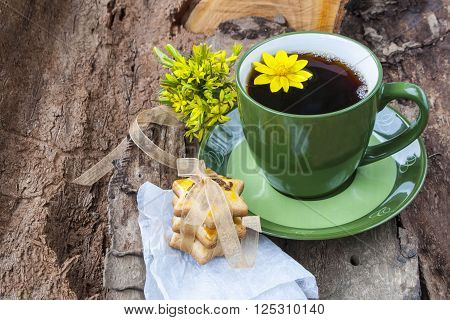 cup of tea, dessert cookies with sesame seeds on a background of tree bark.
** Note: Soft Focus at 100%, best at smaller sizes