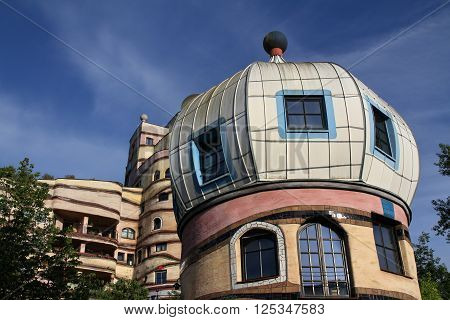 Darmstadt, Germany - May 19, 2015: View of the Forest Spiral, Darmstadt, Germany. The Waldspirale is a residential building complex in Darmstadt, Germany, built in the 1990s.