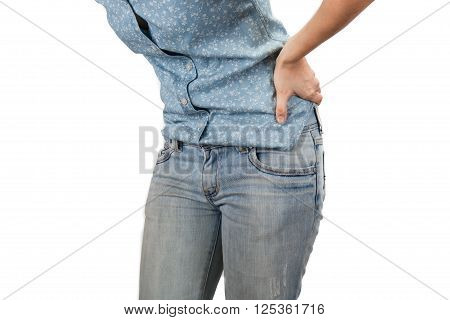 woman holding hands to his aching back