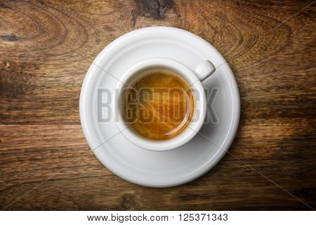 isolated coffee cup top view on wooden background