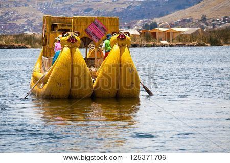 Totora boat on the Titicaca lake near Puno, Peru