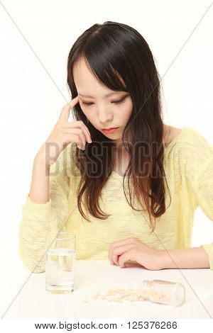 portrait of young Japanese woman suffers from melancholy