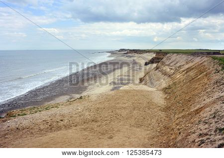 Changing landscape as the coastline and beach at Happisburgh in North Norfolk suffers coastal erosion.