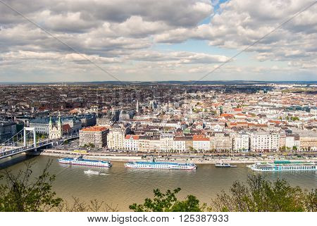 Peautiful panorama of Budapest city with Danube river, bridges and boats, Hungary. Cityscape with blue sky and gorgeous clouds.
** Note: Soft Focus at 100%, best at smaller sizes