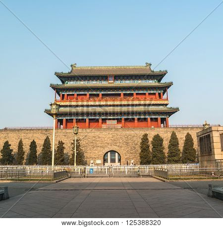 Beijing, China at the Zhengyangmen Gatehouse in Tiananmen Square. Beautiful historical building at sunset.