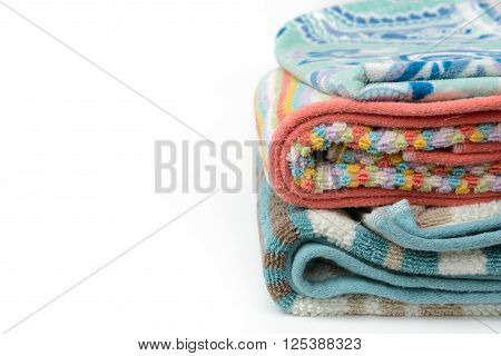 Clean colorful towel folding and stack on isolated background