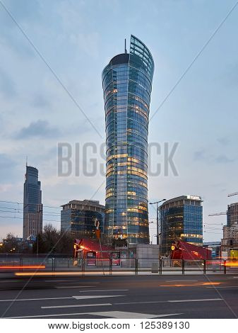 Warsaw, Poland - March 28, 2016: Office building Warsaw Spire under construction in Warsaw, Poland. Warsaw Spire is a modern landmark and a powerful symbol of Warsaws energy.