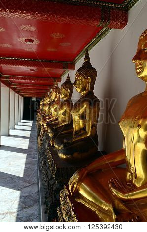 Golden Buddha Sculptures In Wat Pho, Bangkok, Thailand