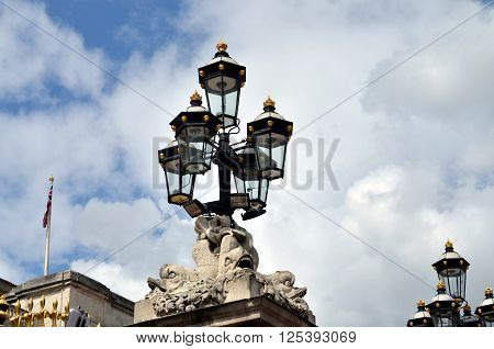 old historic lantern in front of buckinham palace london