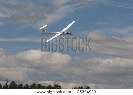 Minsk Belarus-June 21 2014: Glider in Air During Aviation Sport Event Dedicated to the 80th Anniversary of DOSAAF Foundation in Minsk on June 21 2014 in Minsk Republic of Belarus