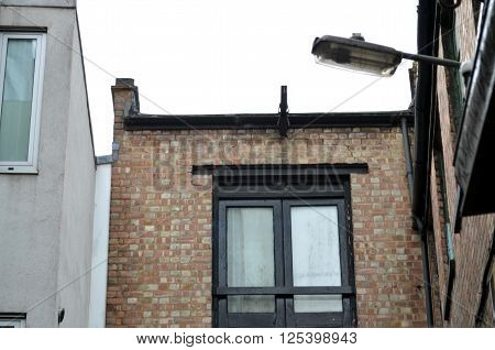 view on backyard and roofs in the city of london at a sunny day in camden town