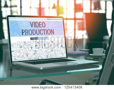 Video Production Concept. Closeup Landing Page on Laptop Screen in Doodle Design Style. On Background of Comfortable Working Place in Modern Office. Blurred, Toned Image. 3D Render.