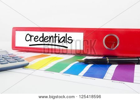 Word credentials underlined against business desk with documents