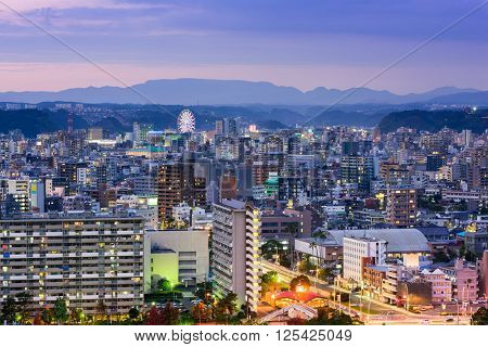 Kagoshima, Japan cityscape at dusk.