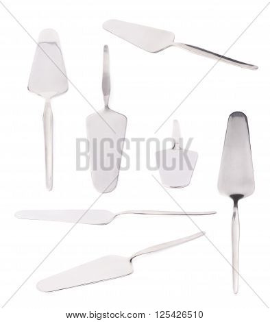Steel metal cake server tool isolated over the white background, set of multiple different foreshortenings