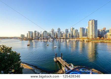 View from the Cambie Bridge. Downtown skyline in Vancouver Canada.