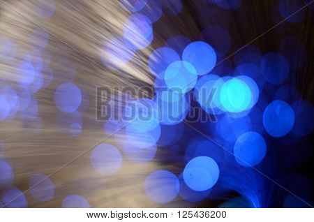 Blurred abstract pink and blue bokeh lights. Christmas holiday defocused background. Backdrop for your design