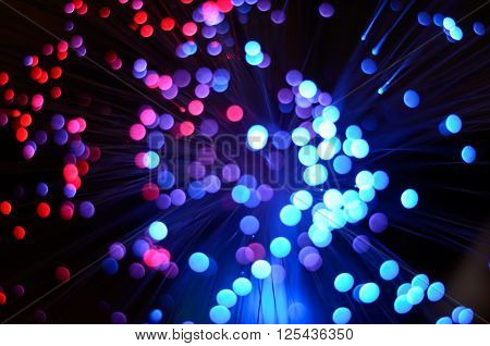 Blurred abstract pink and blue bokeh lights. Christmas holiday defocused background. Backdrop for your design