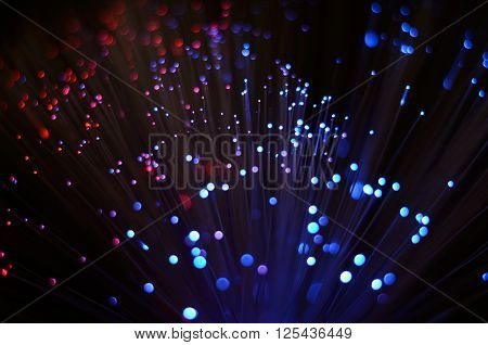 Blurred abstract pink and blue bokeh lights. Christmas holiday defocused background. Backdrop for your design