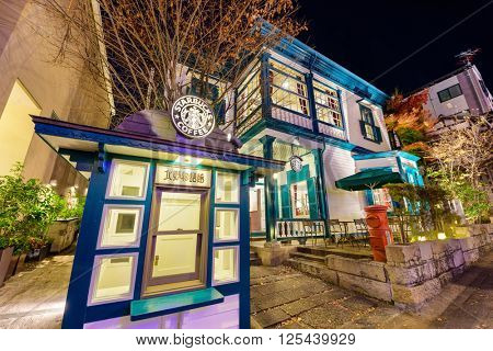 KOBE, JAPAN - DECEMBER 12, 2015: Starbucks coffee shop in the Kitano District of Kobe. The repuropsed home was originally erected in 1907 for foreign residents and is a designated cultural property.