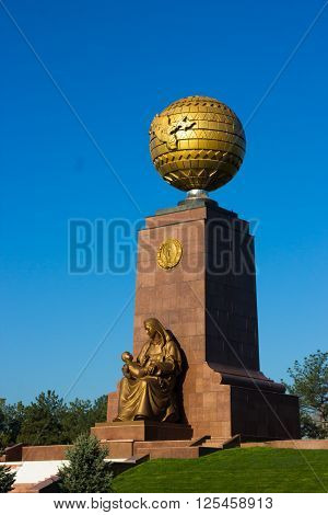 TASHKENT UZBEKISTAN - 2016 March 21: The Independence Monument with the globe and mother with child symbolizing Motherland
