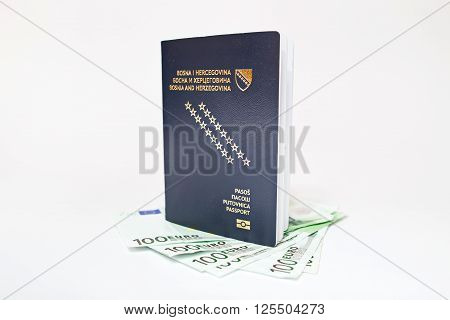 Bosnian passport and euro banknotes  on white background