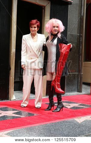LOS ANGELES - APR 11:  Sharon Osbourne, Cyndi Lauper at the Harvey Fierstein and Cyndi Lauper Hollywood Walk of Fame Ceremony at the Pantages Theater on April 11, 2016 in Los Angeles, CA